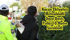 Kaçan Ehliyetsiz Motosikletli Gaza Bastı, Polisi 10 Metre Sürükledi