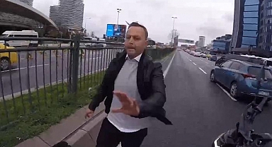 Şişli trafiğinde korna kavgası! Polisin yanında araca yumruk attı!